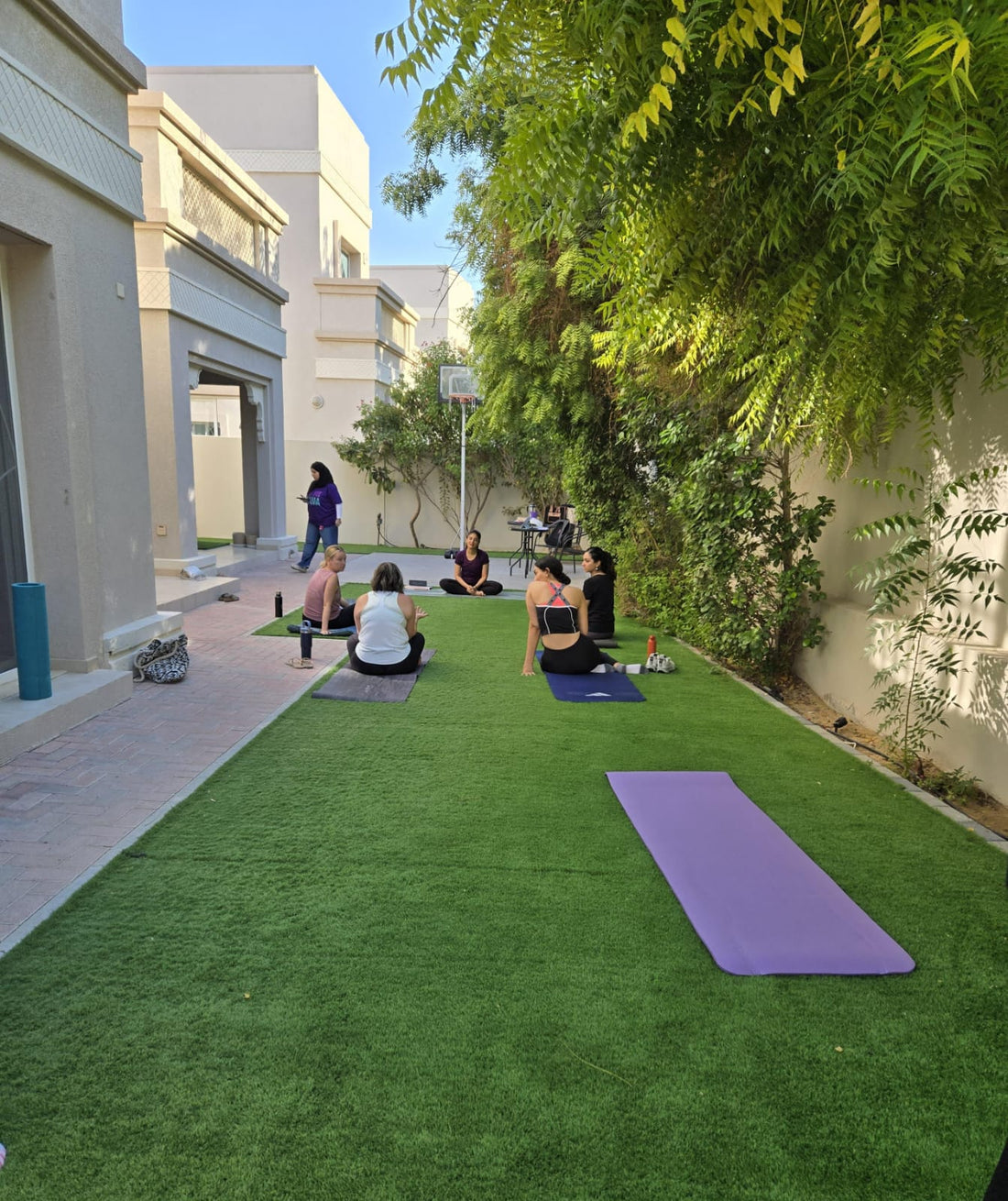 Pilates class for our mamas with childcare services in a beautiful, tranquil outdoor setting